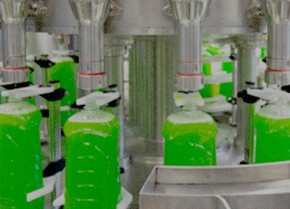 Green liquid in plastic bottle